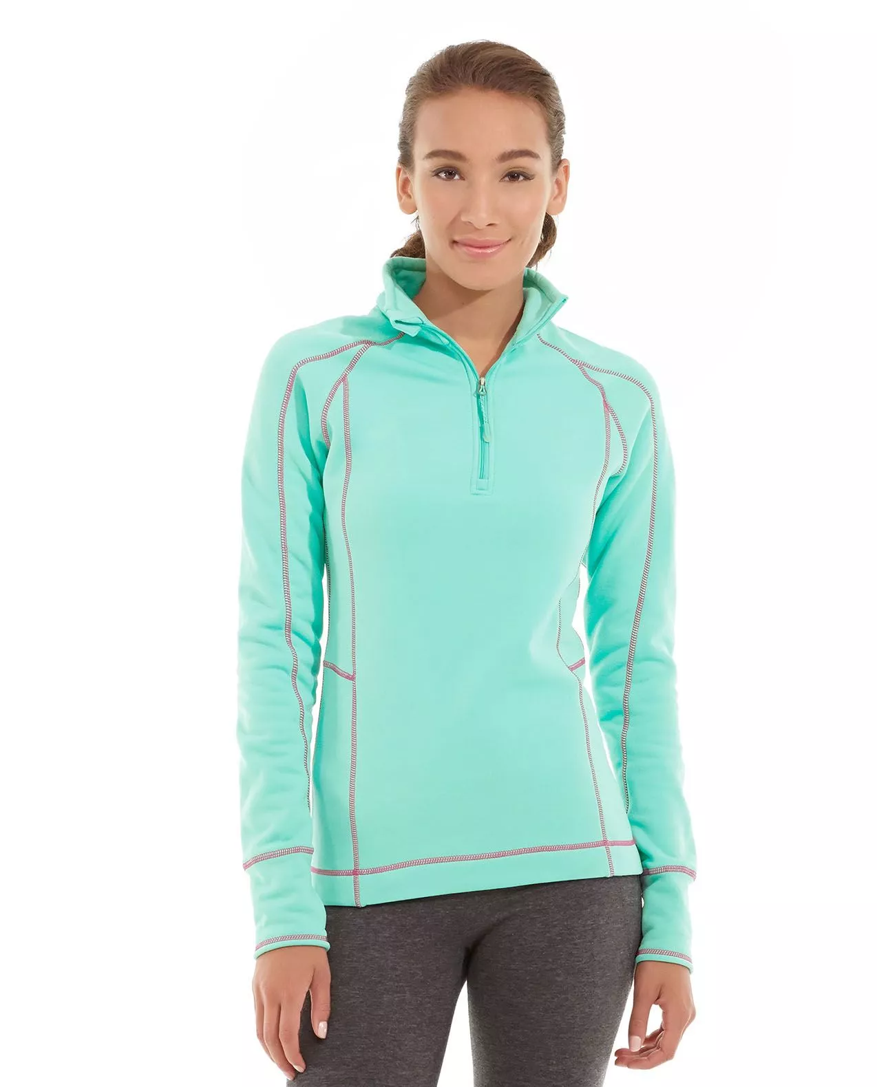 Woman in a mint Jade Yoga Jacket